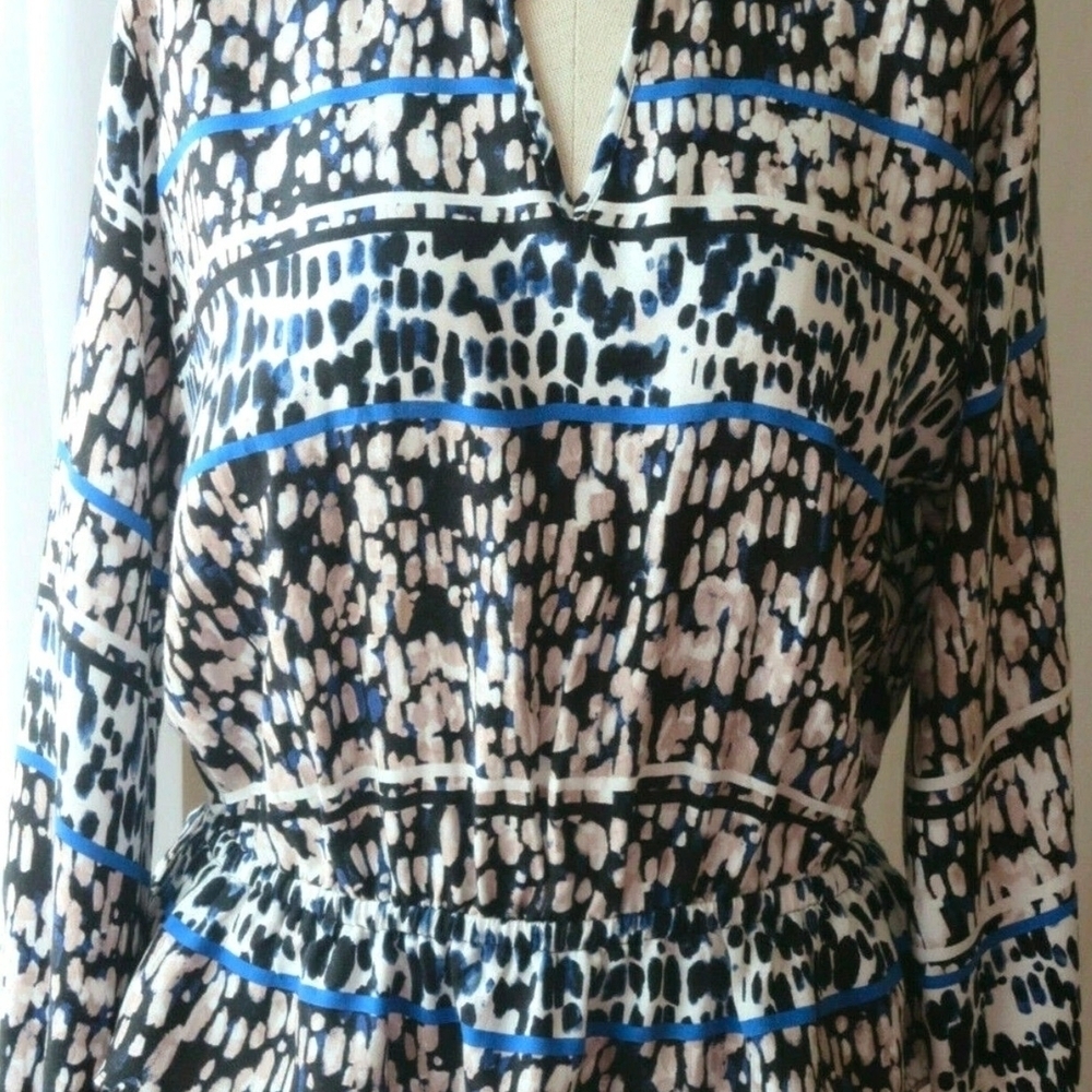 Jennifer Lopez Black and White Blouse with Blue Accents